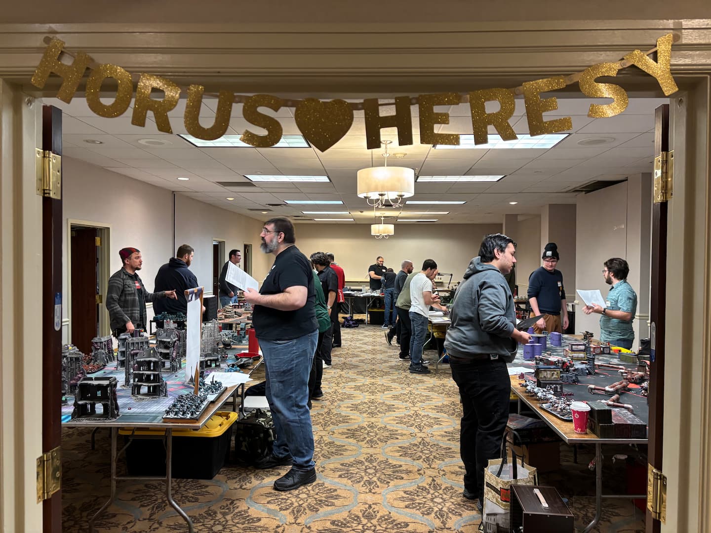 A packed room full of people playing Horus Heresy